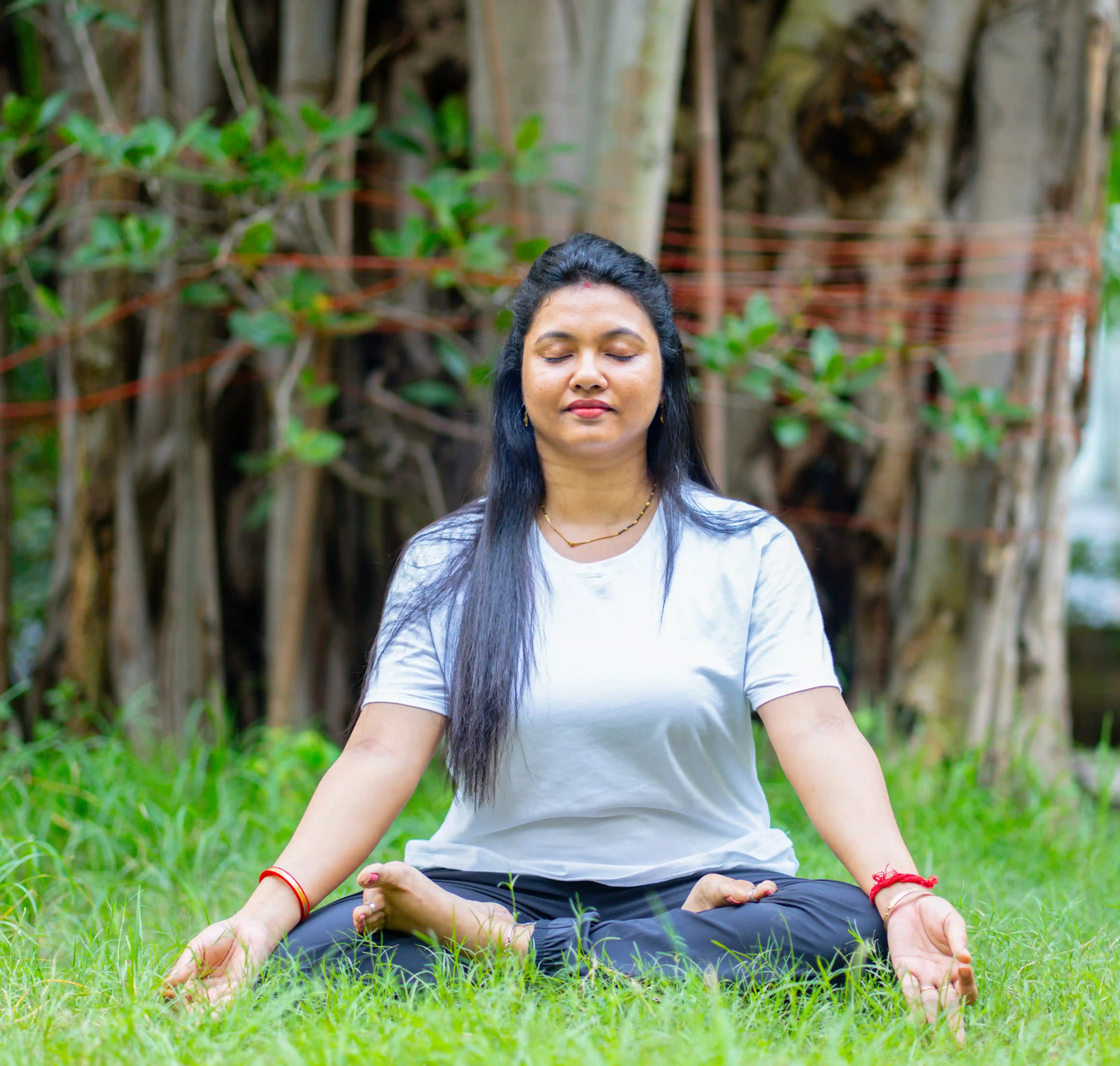 Global students practicing instructor yoga and deep spiritual awakening techniques at Nabatara, guided by Gaurav Tribedi.